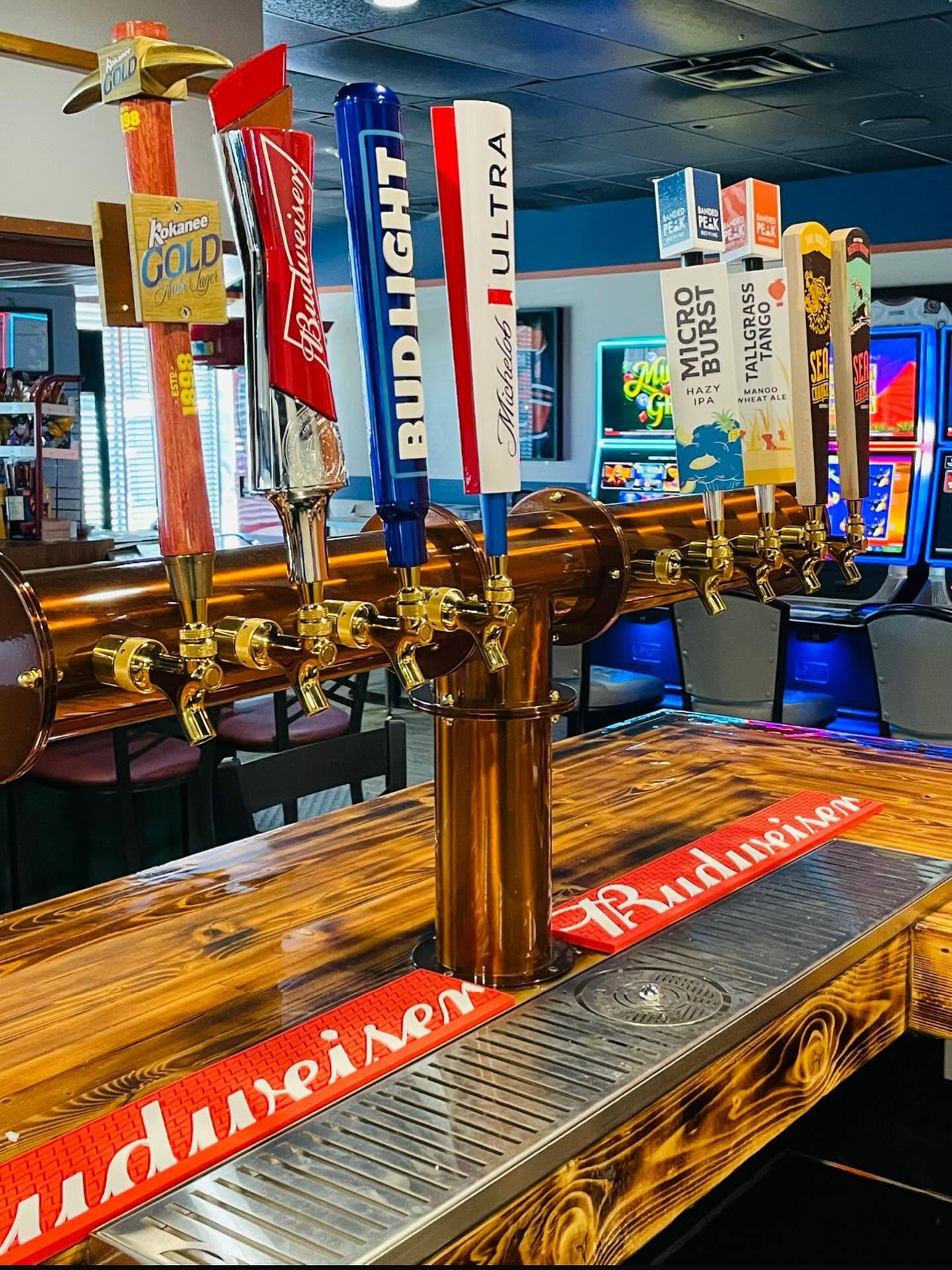 Rainbow Bar Fort Saskatchewan tap tower with wine and liquor shelving